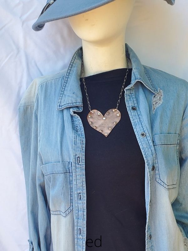 denim outfit with copper heart statement necklace